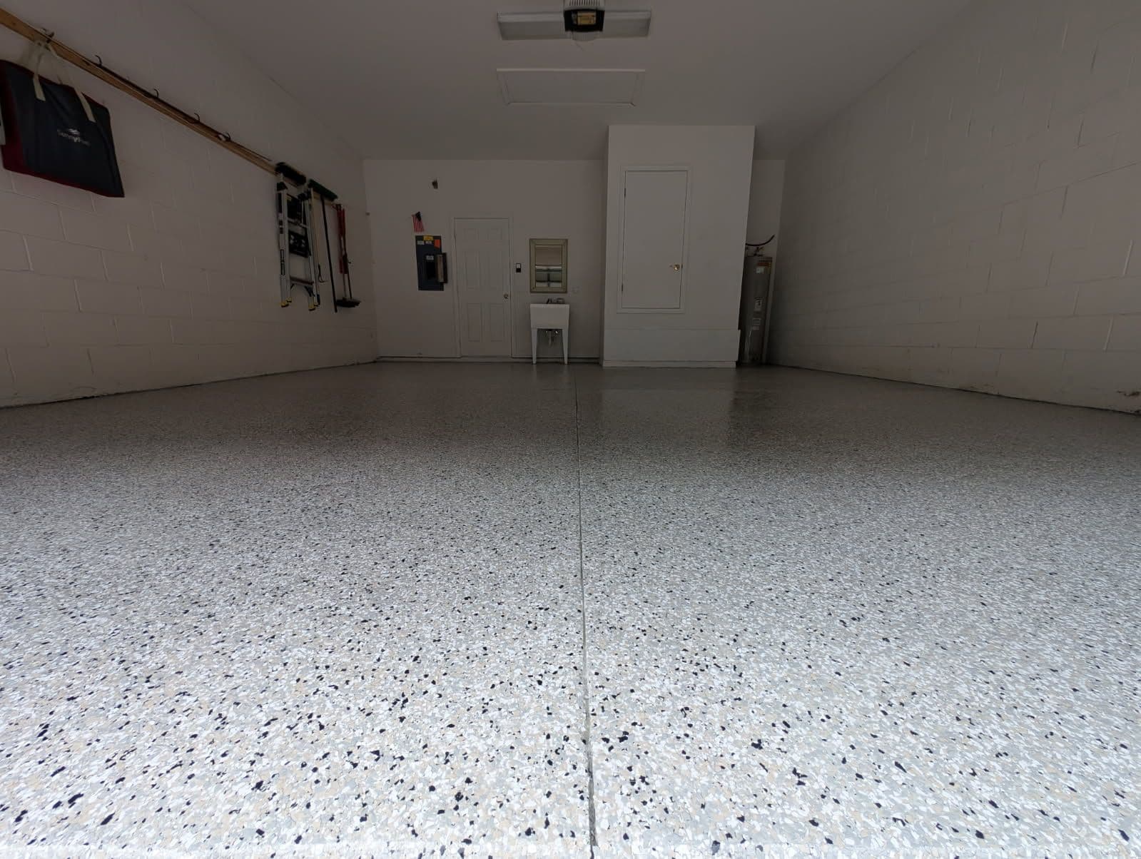 Gallery photos for Stunning Polyaspartic Flake Floor Transformation: Image #1