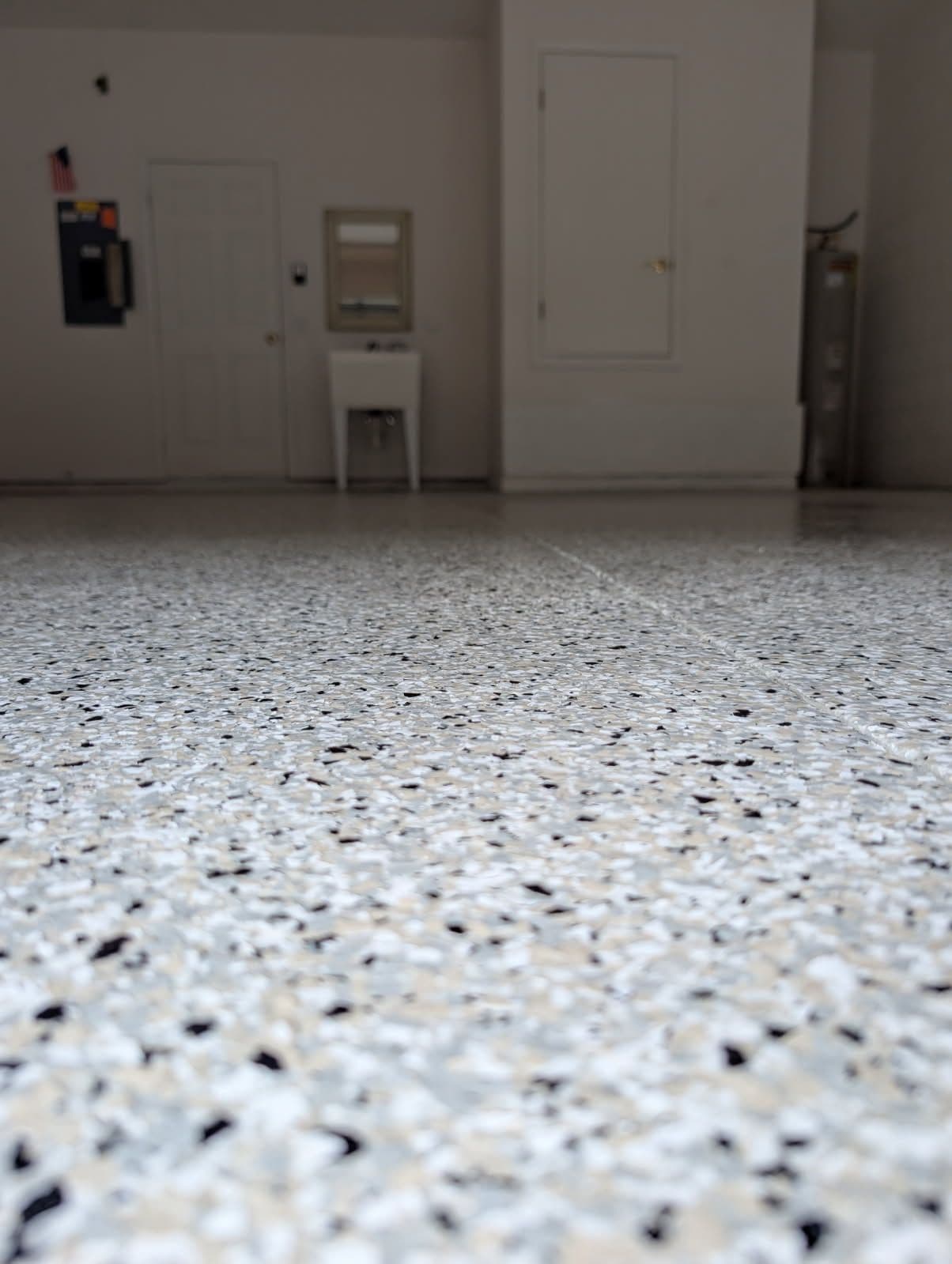 Gallery photos for Stunning Polyaspartic Flake Floor Transformation: Image #2