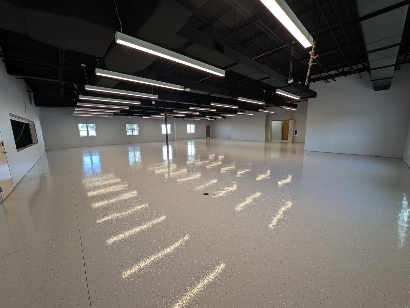 Gallery photos for Custom Polyaspartic Floor Installation at Monteverde Academy: Image #1