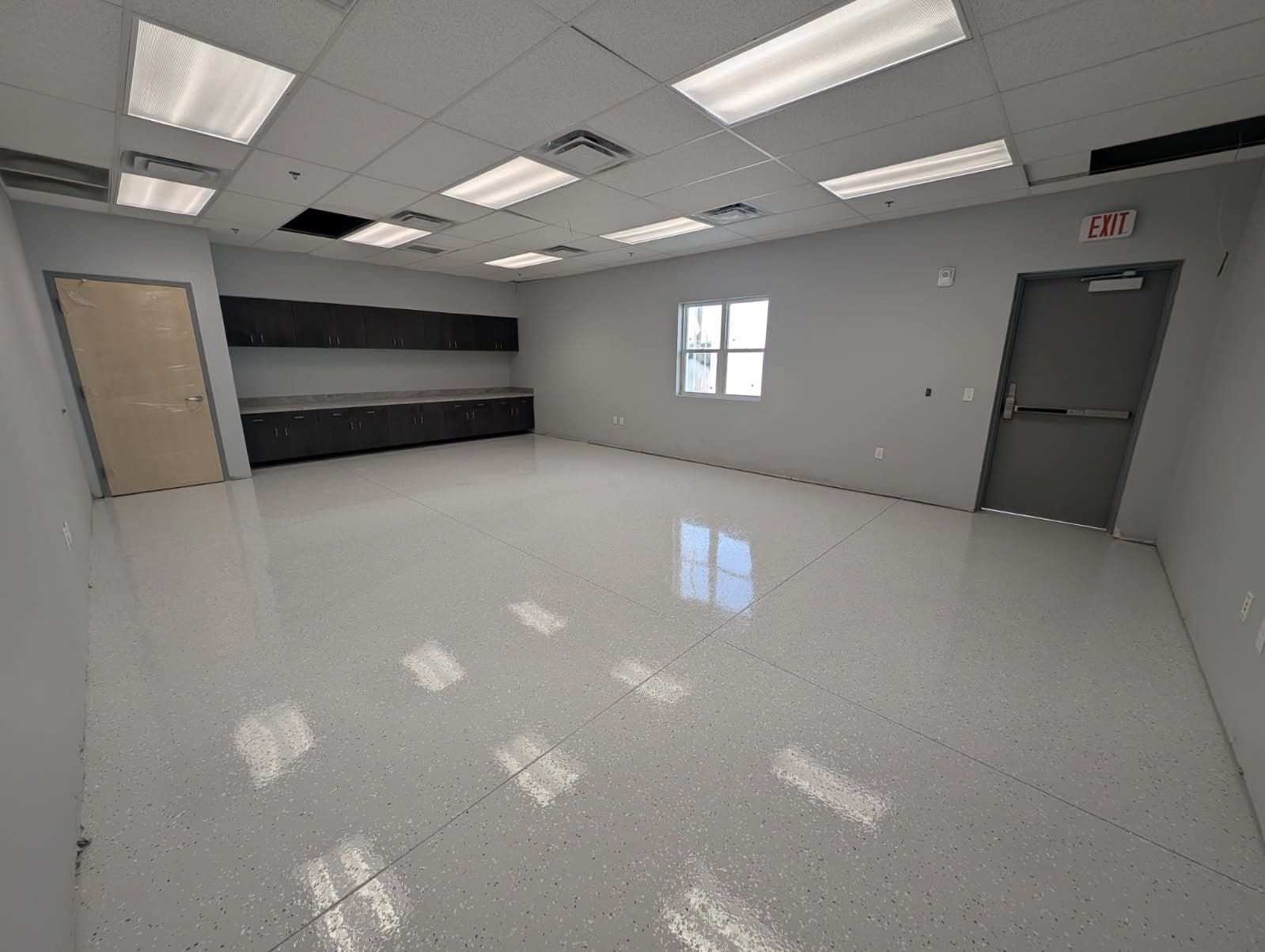 Gallery photos for Custom Polyaspartic Floor Installation at Monteverde Academy: Image #2