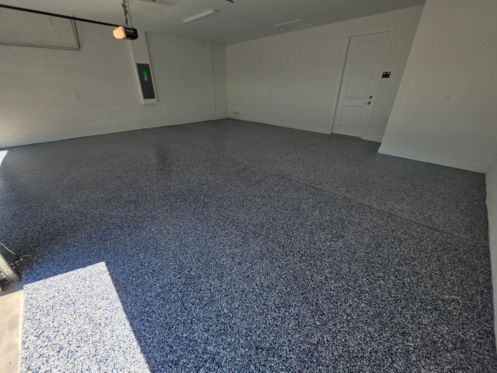 Gallery photos for Sleek Garage Makeover in Winter Garden with Orbit Polyaspartic Flake Coating: Image #1