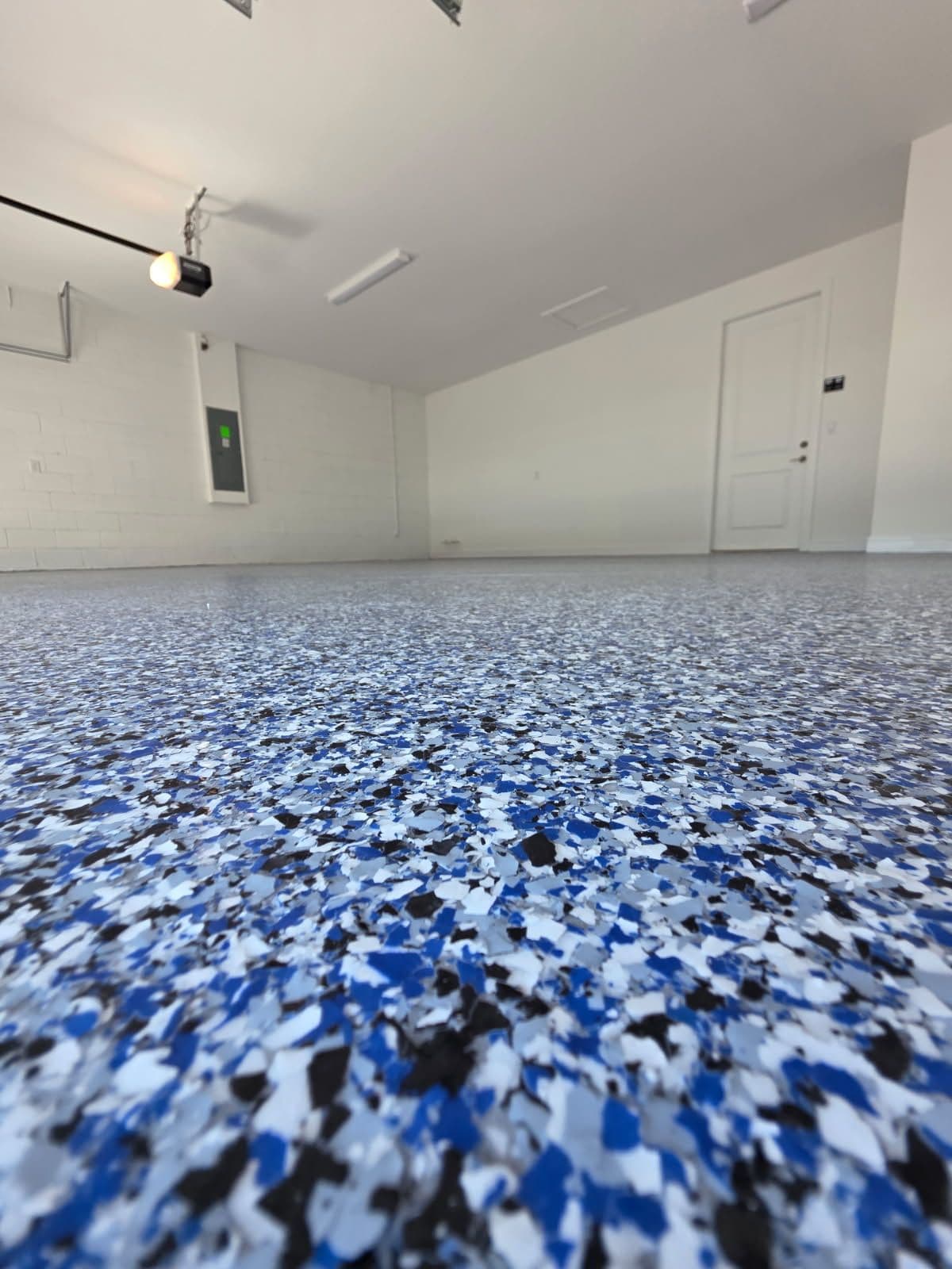 Gallery photos for Sleek Garage Makeover in Winter Garden with Orbit Polyaspartic Flake Coating: Image #2