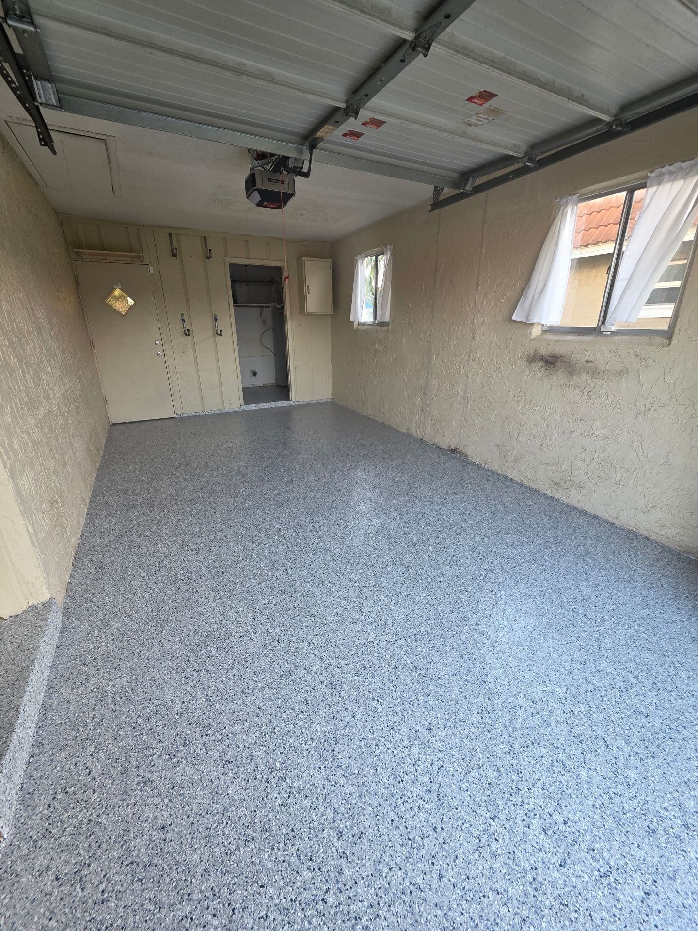 Gallery photos for Stunning Garage Transformation with Polyaspartic Flake Coating: Image #1