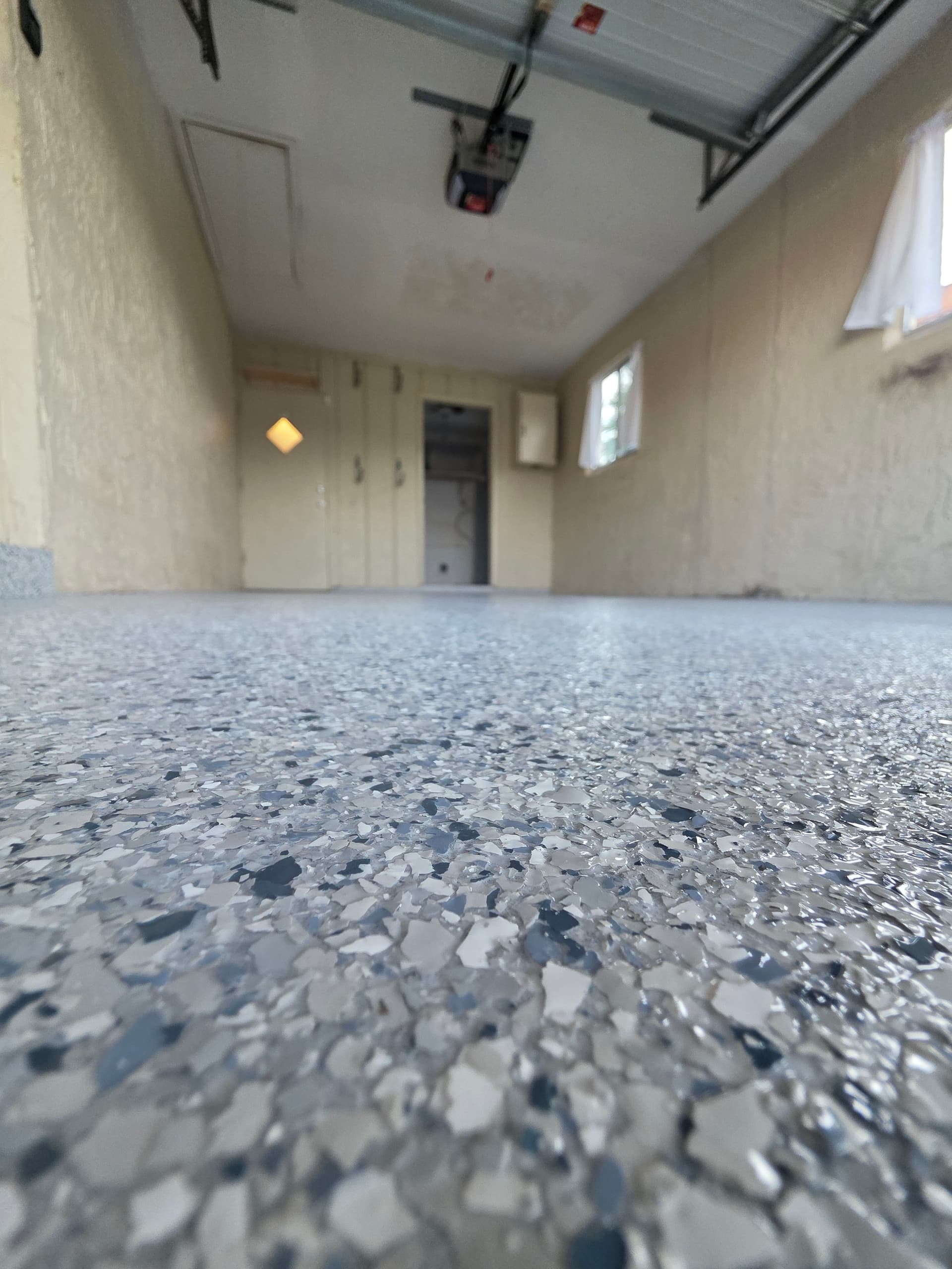 Gallery photos for Stunning Garage Transformation with Polyaspartic Flake Coating: Image #2